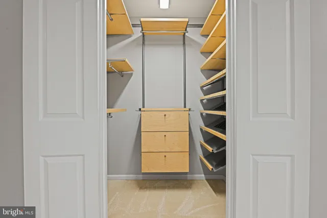 a work room with furniture and windows