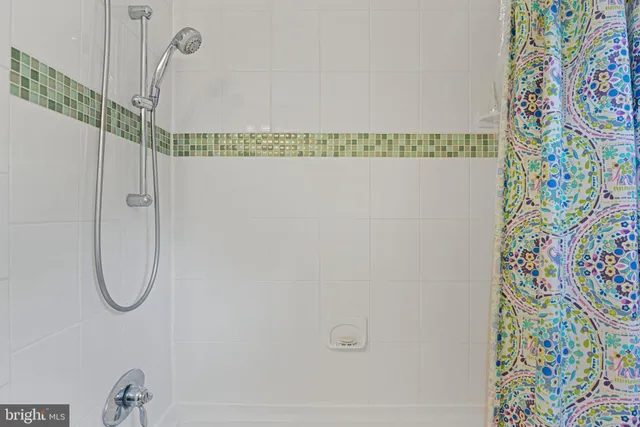 a view of a big room with carpet