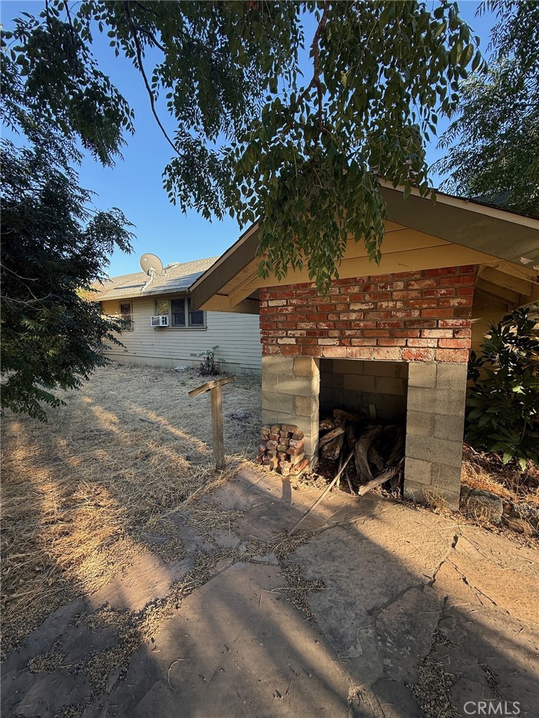 6535 O'Donovan Road Creston, CA 93432 - Photo 7 of 18 a view of a porch with furniture and a fire pit