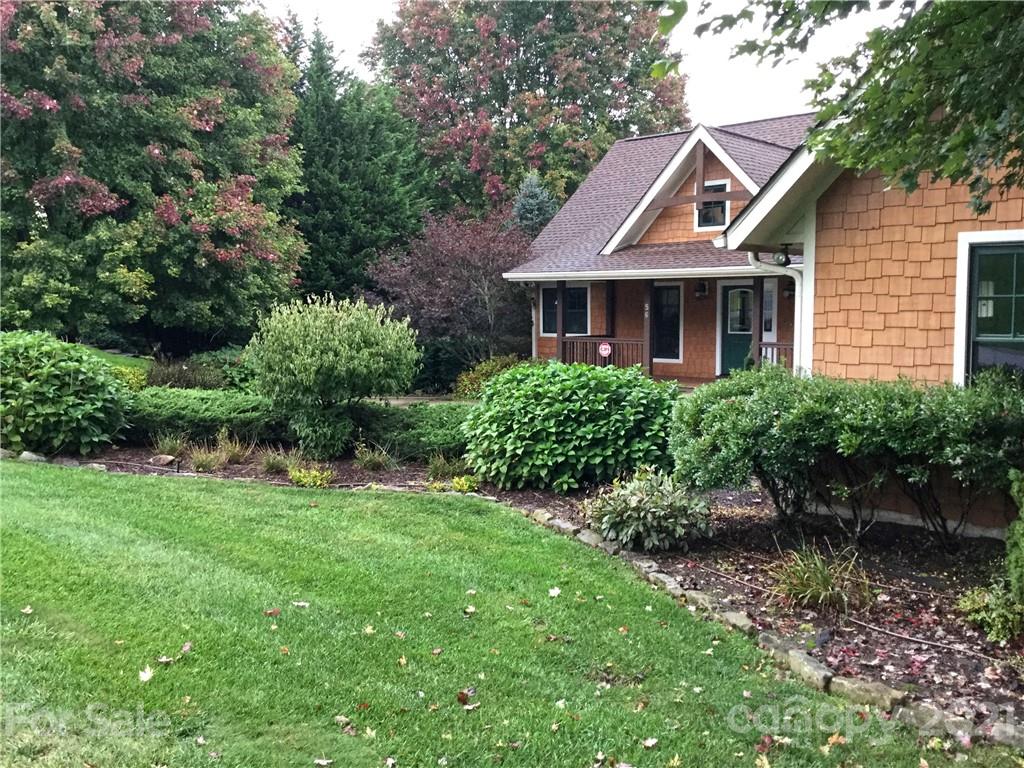 56 Devonshire Drive Mills River, NC 28759 - Photo 2 of 43 a front view of a house with a yard