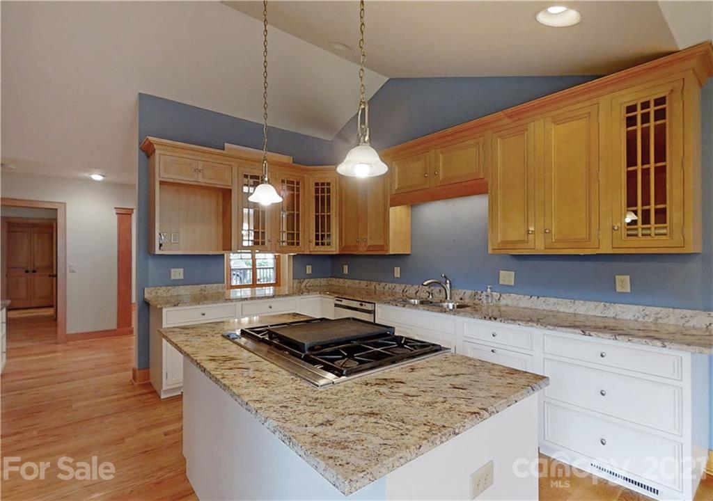 56 Devonshire Drive Mills River, NC 28759 - Photo 11 of 43 a kitchen with stainless steel appliances granite countertop a sink stove and cabinets