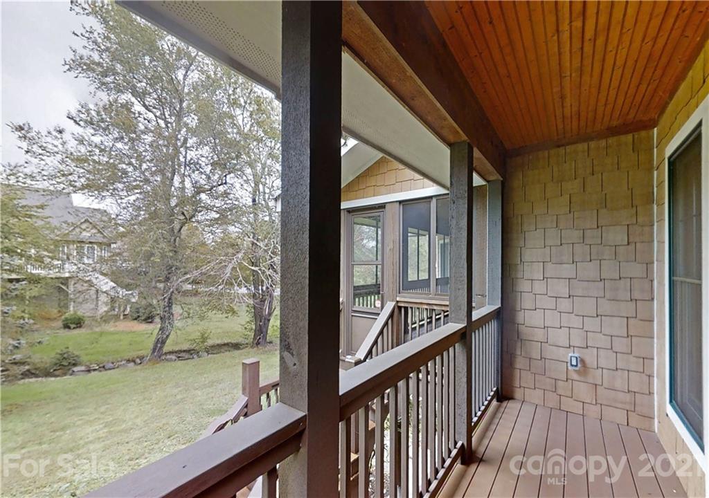 56 Devonshire Drive Mills River, NC 28759 - Photo 14 of 43 a view of a balcony with wooden floor and fence
