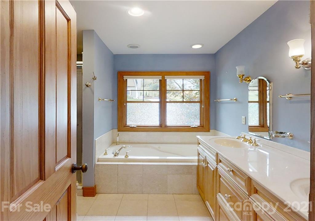 56 Devonshire Drive Mills River, NC 28759 - Photo 15 of 43 a spacious bathroom with sink and bathtub
