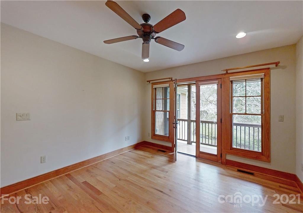 56 Devonshire Drive Mills River, NC 28759 - Photo 18 of 43 wooden floor in an empty room with a window