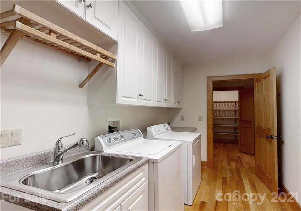 56 Devonshire Drive Mills River, NC 28759 - Photo 21 of 43 a kitchen that has a sink and a stove