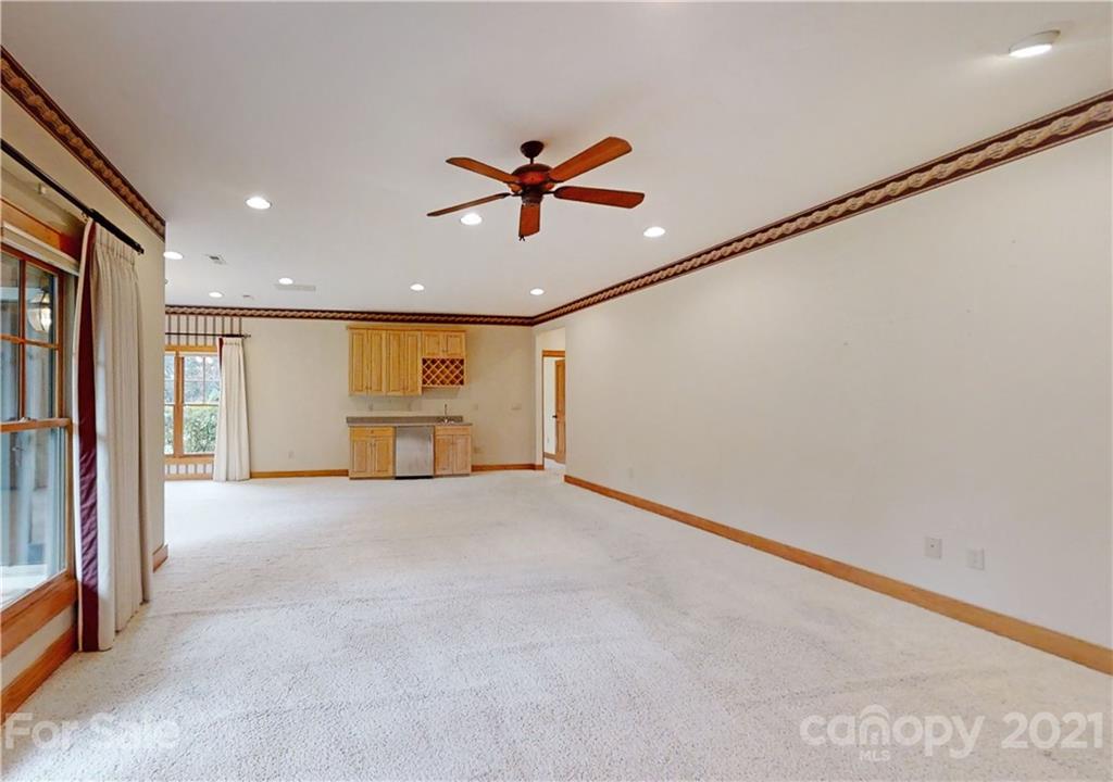 56 Devonshire Drive Mills River, NC 28759 - Photo 26 of 43 a view of a livingroom with a ceiling fan and window