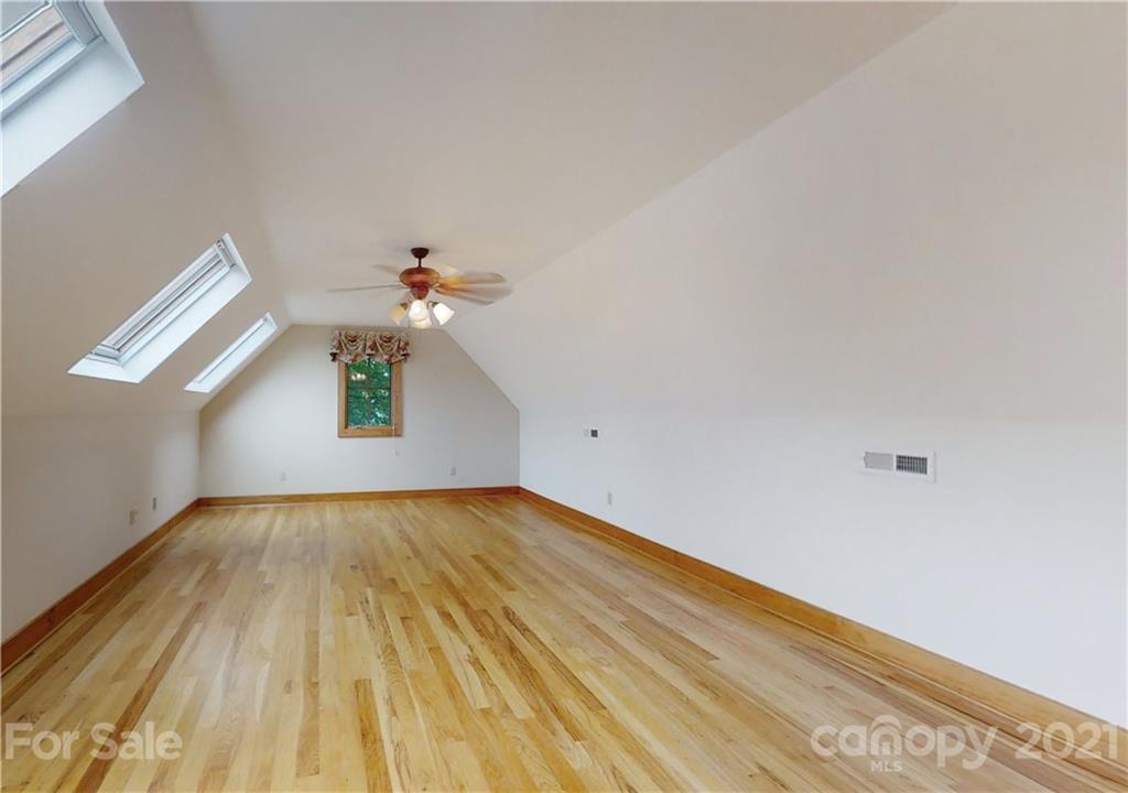 56 Devonshire Drive Mills River, NC 28759 - Photo 35 of 43 a view of empty room with wooden floor