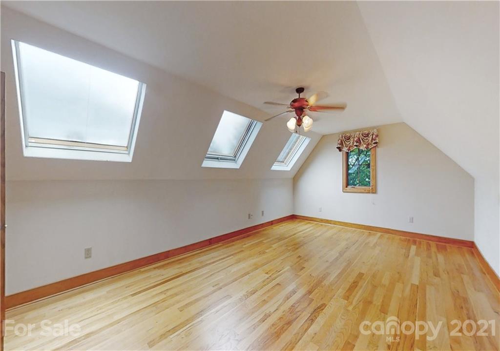56 Devonshire Drive Mills River, NC 28759 - Photo 36 of 43 a view of empty room with wooden floor