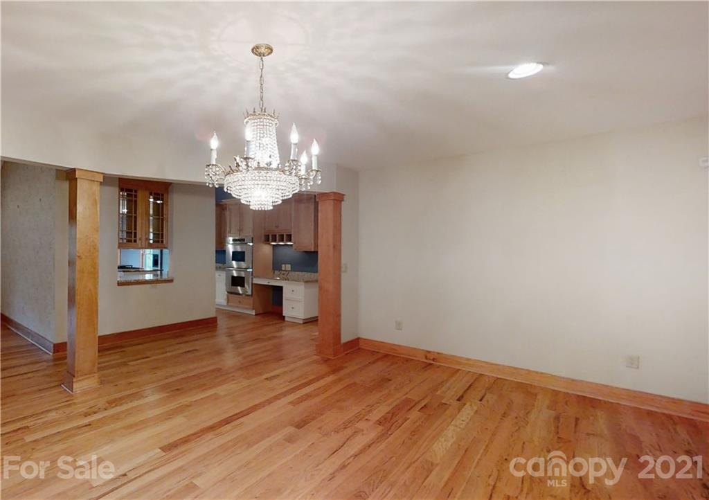 56 Devonshire Drive Mills River, NC 28759 - Photo 7 of 43 a view of a living room and kitchen with wooden floor