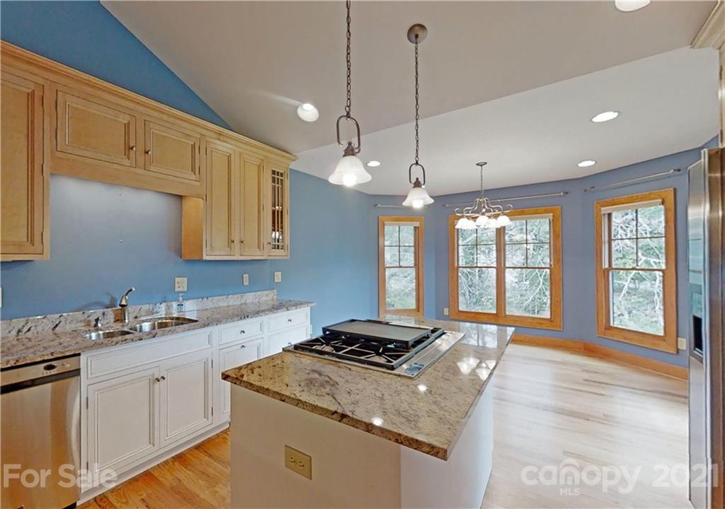 56 Devonshire Drive Mills River, NC 28759 - Photo 9 of 43 a kitchen with a stove a sink and a window