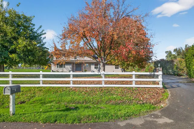 a front view of a house with a garage