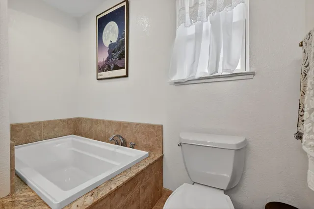 a view of a park with swings and slides