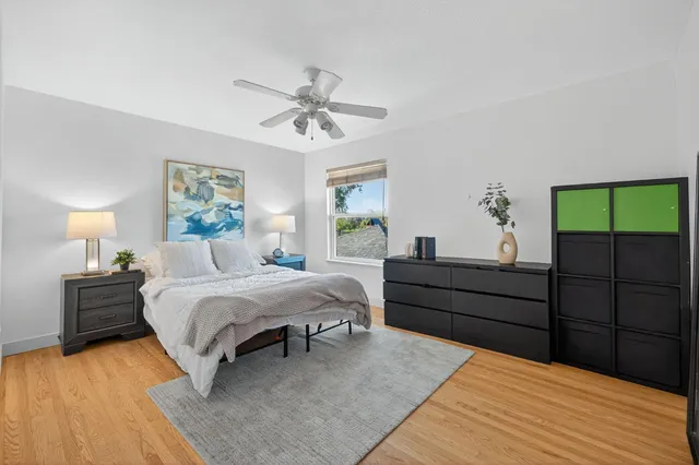 a view of a garage with rack and bicycle