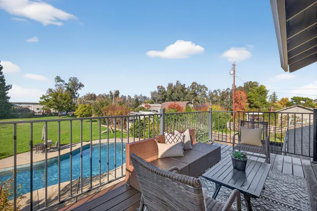 a kitchen with a sink cabinets and a window