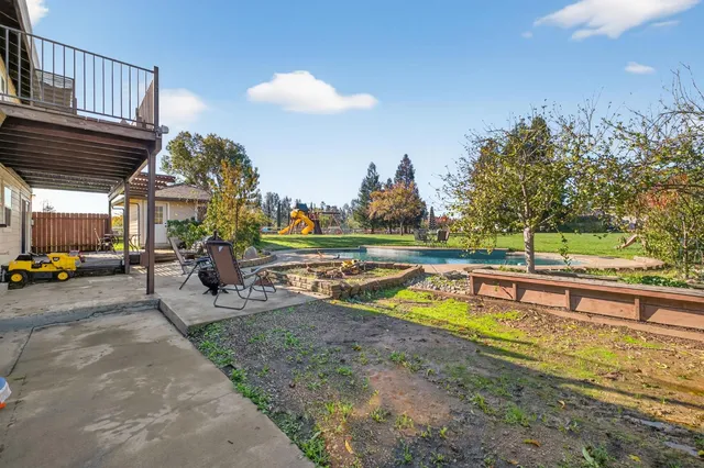 a kitchen with a stove cabinets and a refrigerator