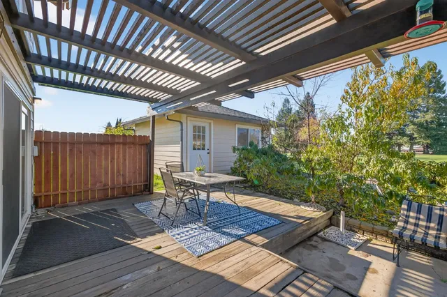 a living room with furniture and flat screen tv