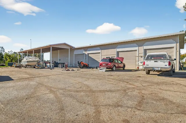 an aerial view of residential building and ocean