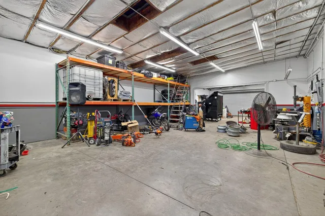 an aerial view of a house with a garden