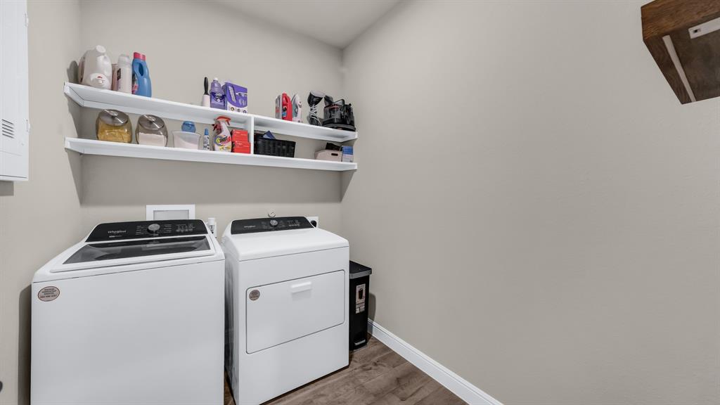 2429 Goodnight Ranch Drive Weatherford, TX 76087 - Photo 25 of 32 a utility room with dryer and washer