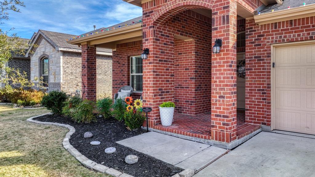 2429 Goodnight Ranch Drive Weatherford, TX 76087 - Photo 26 of 32 a view of house with backyard and garden