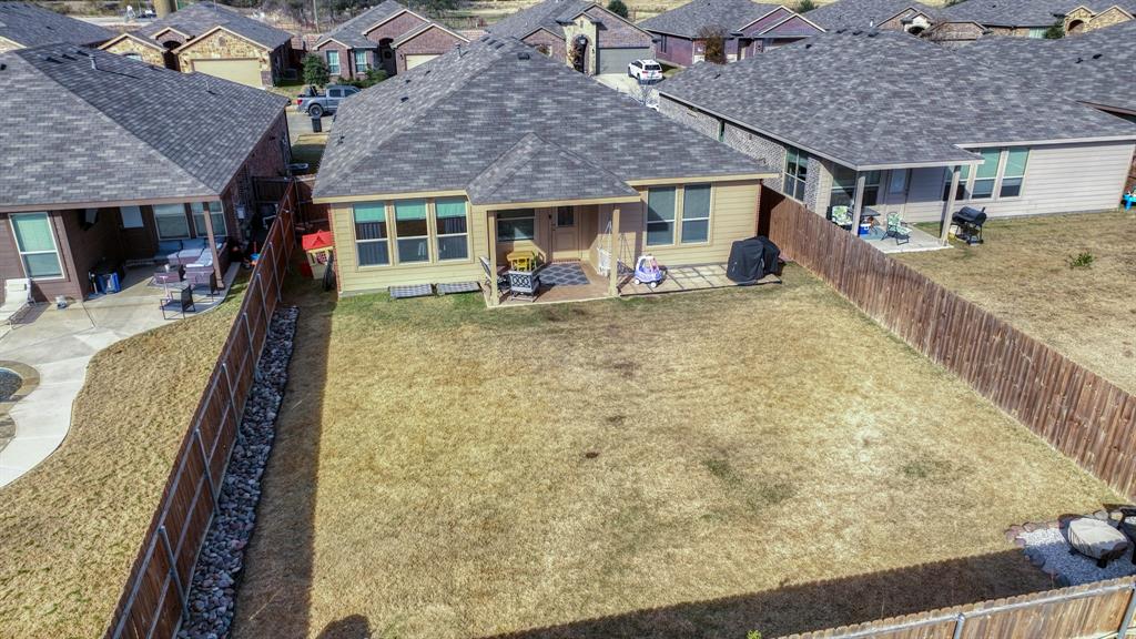 2429 Goodnight Ranch Drive Weatherford, TX 76087 - Photo 32 of 32 a front view of a house with glass windows