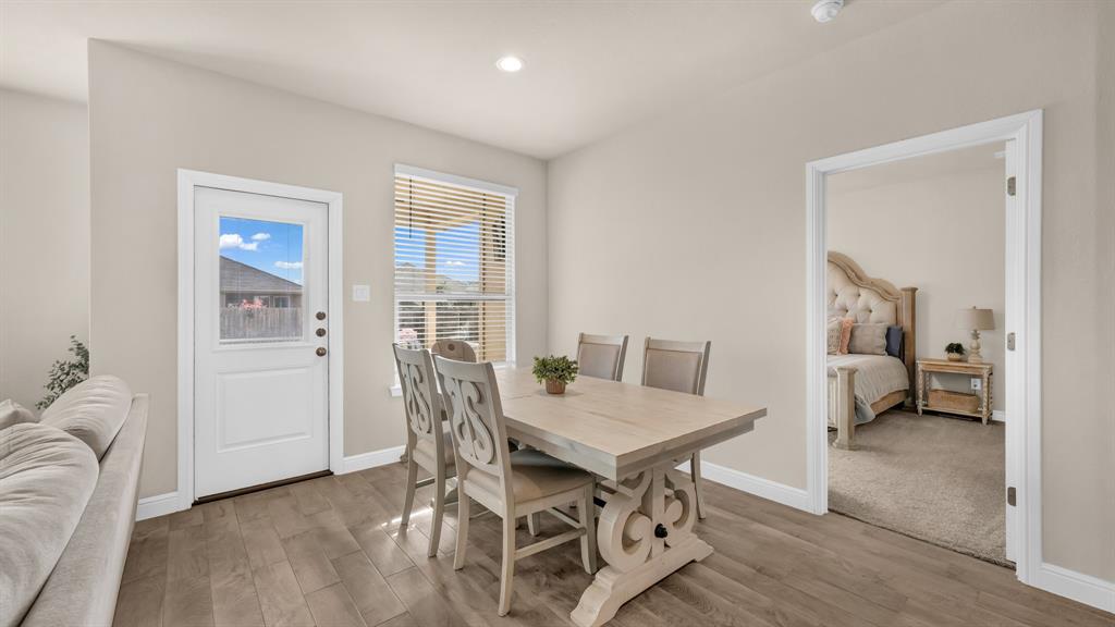 2429 Goodnight Ranch Drive Weatherford, TX 76087 - Photo 10 of 32 a workspace with furniture and window