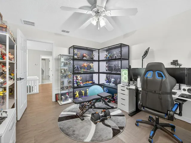 a view of a workspace with furniture