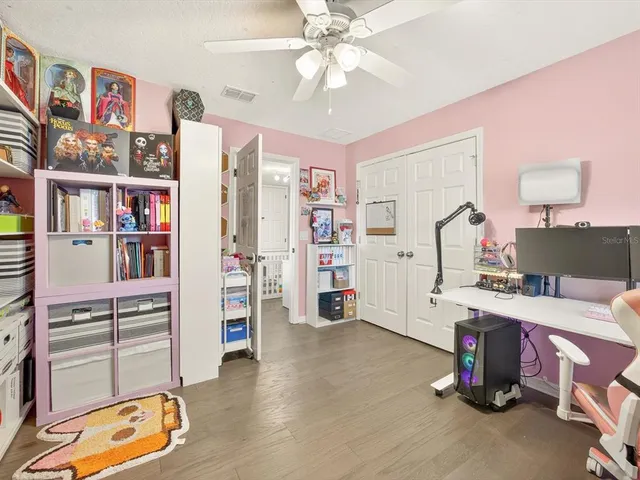 a view of a workspace with furniture