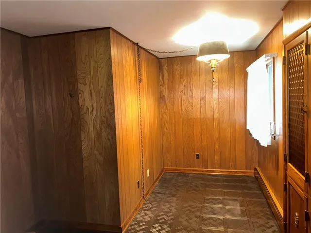 a view of a bathroom with shower and a window