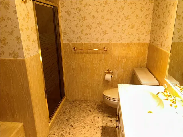 a bathroom with a sink and a toilet
