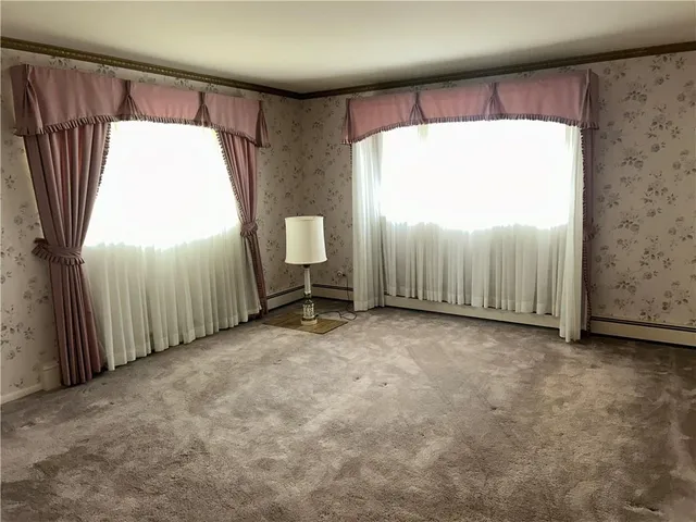 a view of a livingroom with a staircase