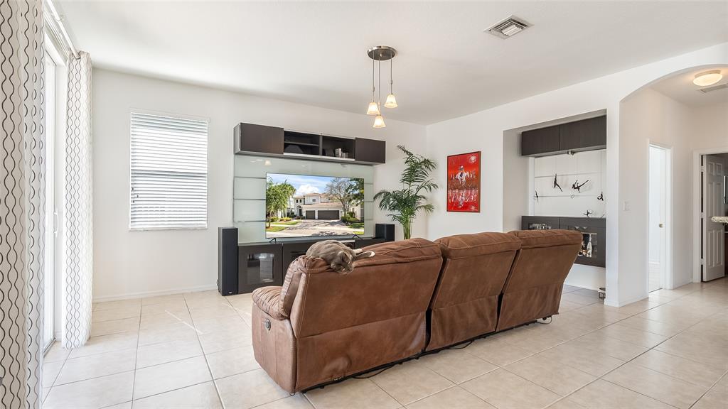 19470 Stonebrook Street Weston, FL 33332 - Photo 14 of 44 a living room with furniture and a window