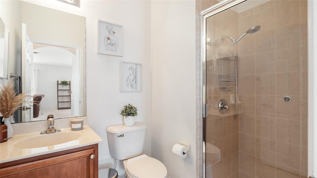 19470 Stonebrook Street Weston, FL 33332 - Photo 38 of 44 a bathroom with a sink toilet and shower