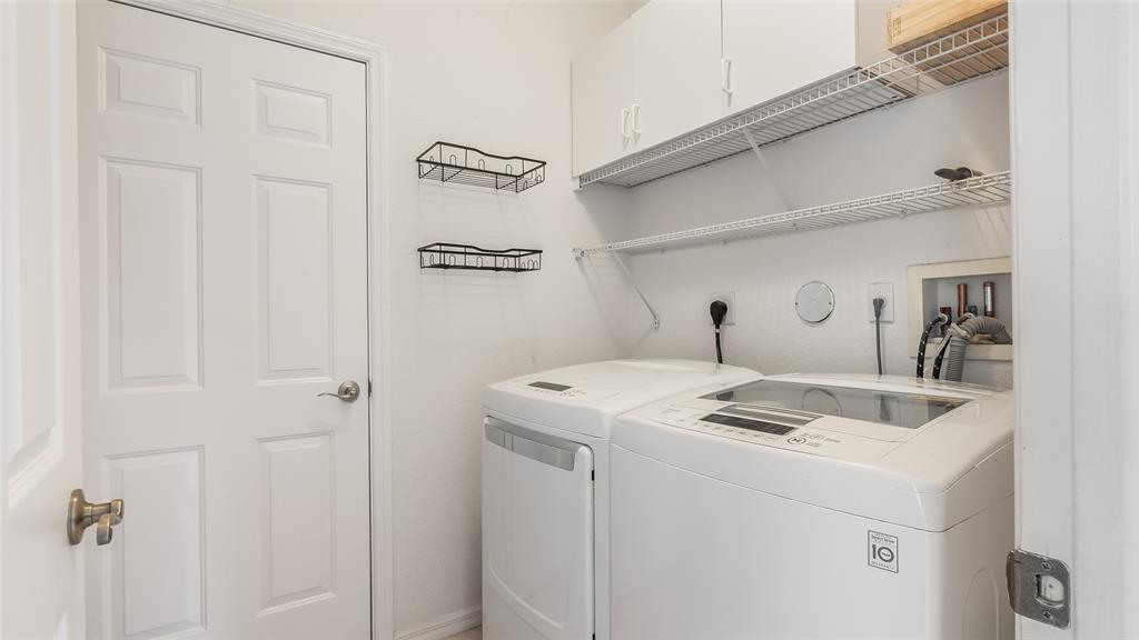 19470 Stonebrook Street Weston, FL 33332 - Photo 42 of 44 a utility room with dryer and washer