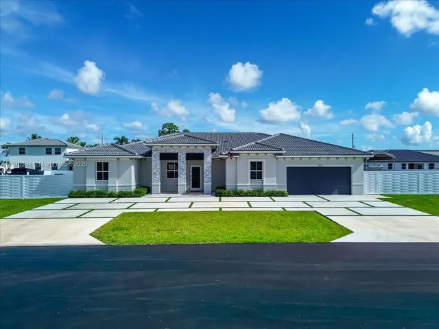 a view of a house with swimming pool