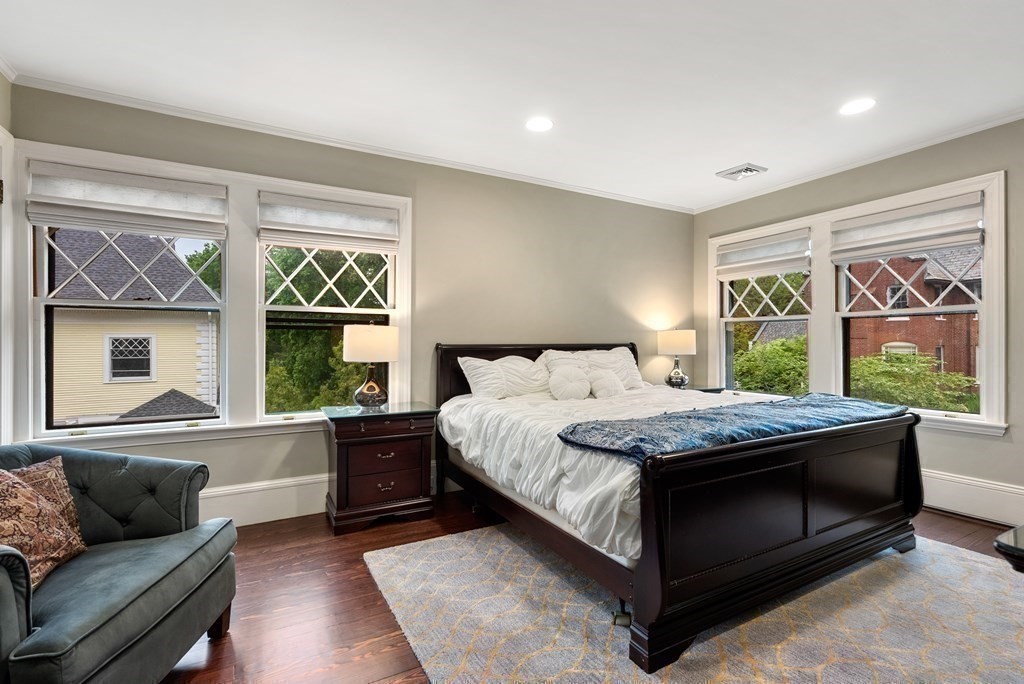 19 Burnham Road Newton, MA 02465 - Photo 20 of 30 a bedroom with a bed and a couch