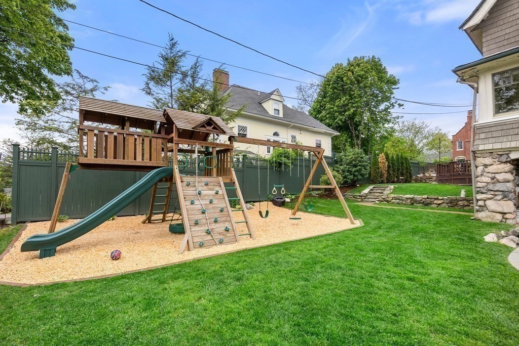 19 Burnham Road Newton, MA 02465 - Photo 25 of 30 a view of a house with a backyard
