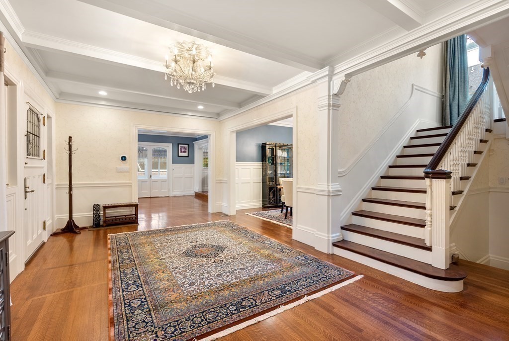 19 Burnham Road Newton, MA 02465 - Photo 3 of 30 a view of a hallway with wooden floor and workspace