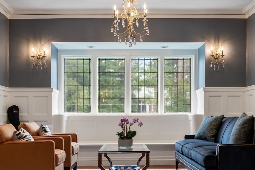 19 Burnham Road Newton, MA 02465 - Photo 4 of 30 a living room with furniture and a chandelier