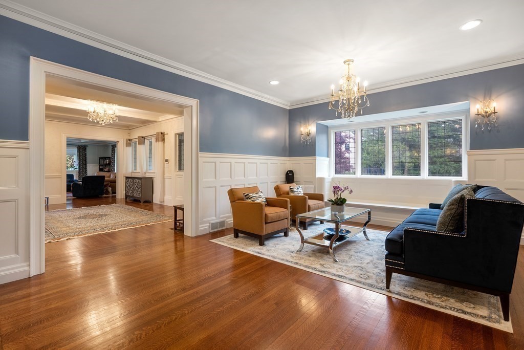 19 Burnham Road Newton, MA 02465 - Photo 5 of 30 a living room with furniture and a chandelier