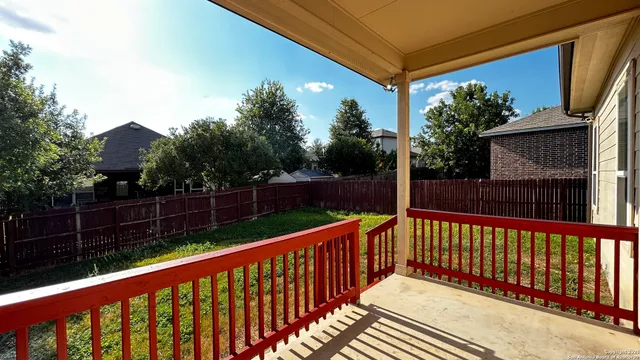 a view of backyard with green space