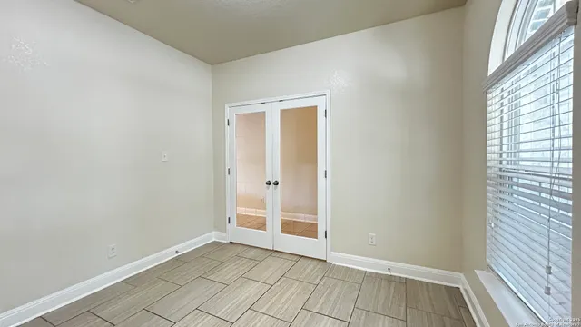 a view of an empty room with window