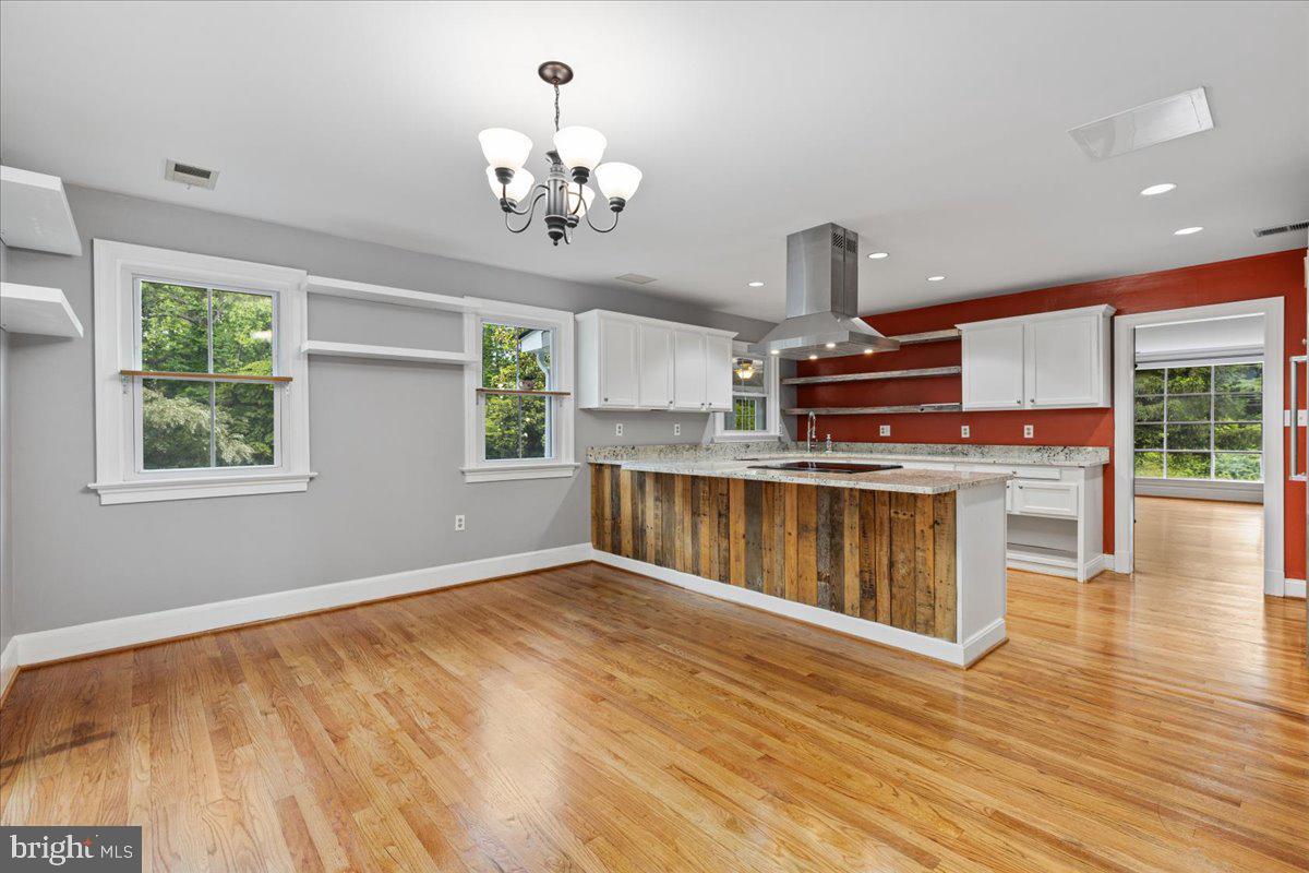 1100 Plum Point Road Huntingtown, MD 20639 - Photo 12 of 52 KITCHEN HAS A BREAKFAST BAR