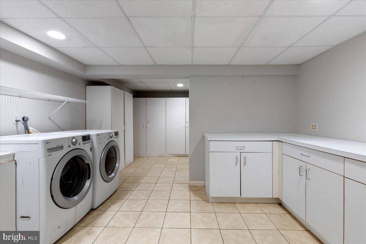 1100 Plum Point Road Huntingtown, MD 20639 - Photo 27 of 52 HUGE LAUNDRY ROOM W/CABINETS