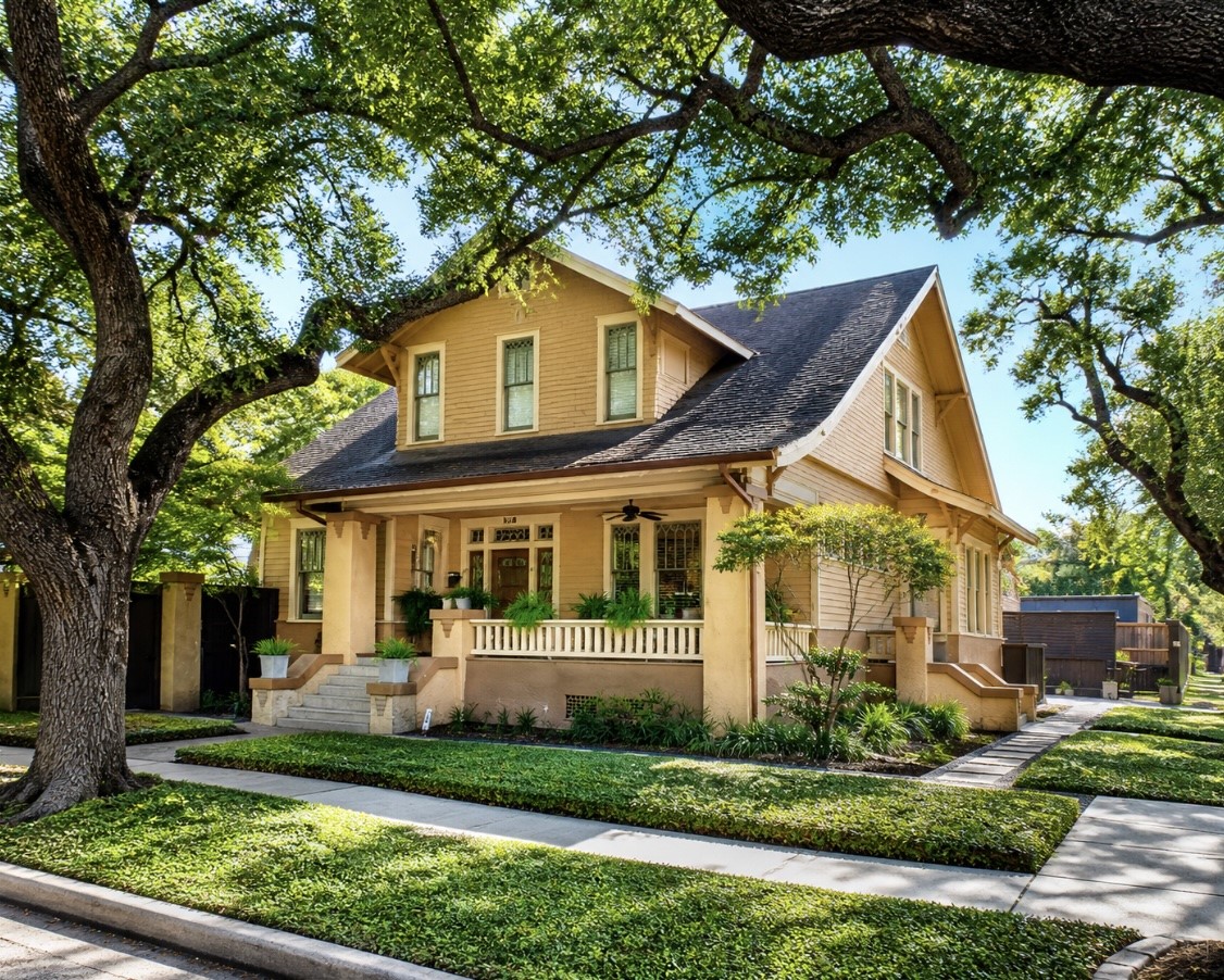 945 Harvard Street Houston, TX 77008 - Photo 5 of 47 Discover this charming historic Craftsman on a lush, tree-lined corner lot in the Heights, featuring mature oaks, a welcoming front porch, and exceptional curb appeal.