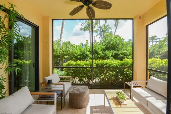 a outdoor living space with furniture and garden view