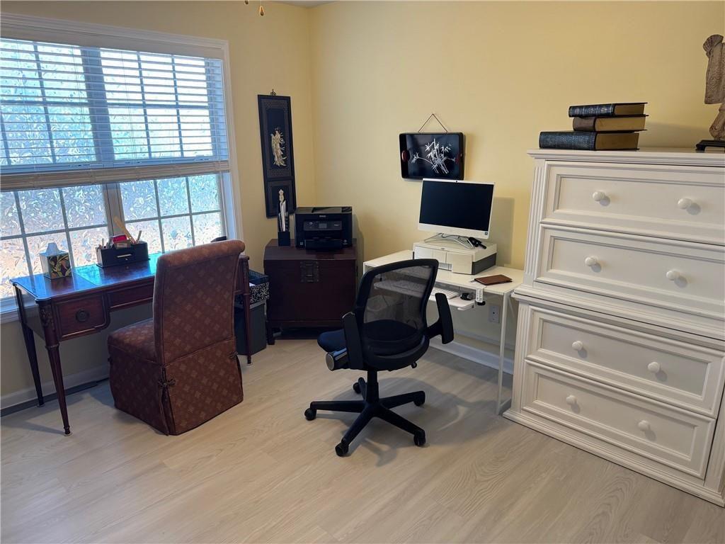 150 Old Mill Road, Unit 406 Cartersville, GA 30120 - Photo 18 of 34 a workspace with furniture and a window