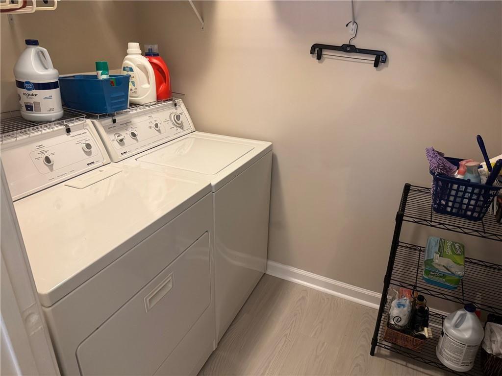 150 Old Mill Road, Unit 406 Cartersville, GA 30120 - Photo 21 of 34 a utility room with dryer and washer