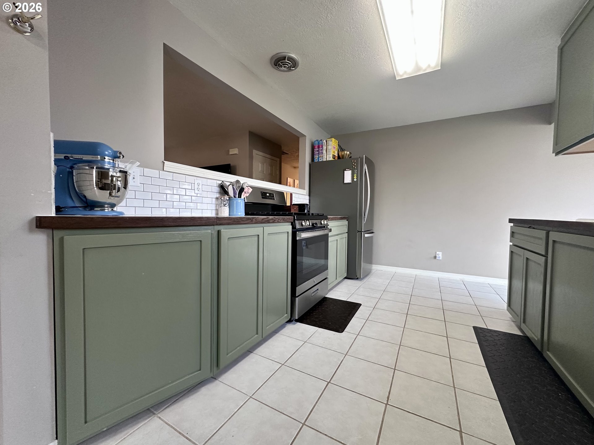 169 West Chestnut Street Union, OR 97883 - Photo 13 of 35 a kitchen with a sink and cabinets