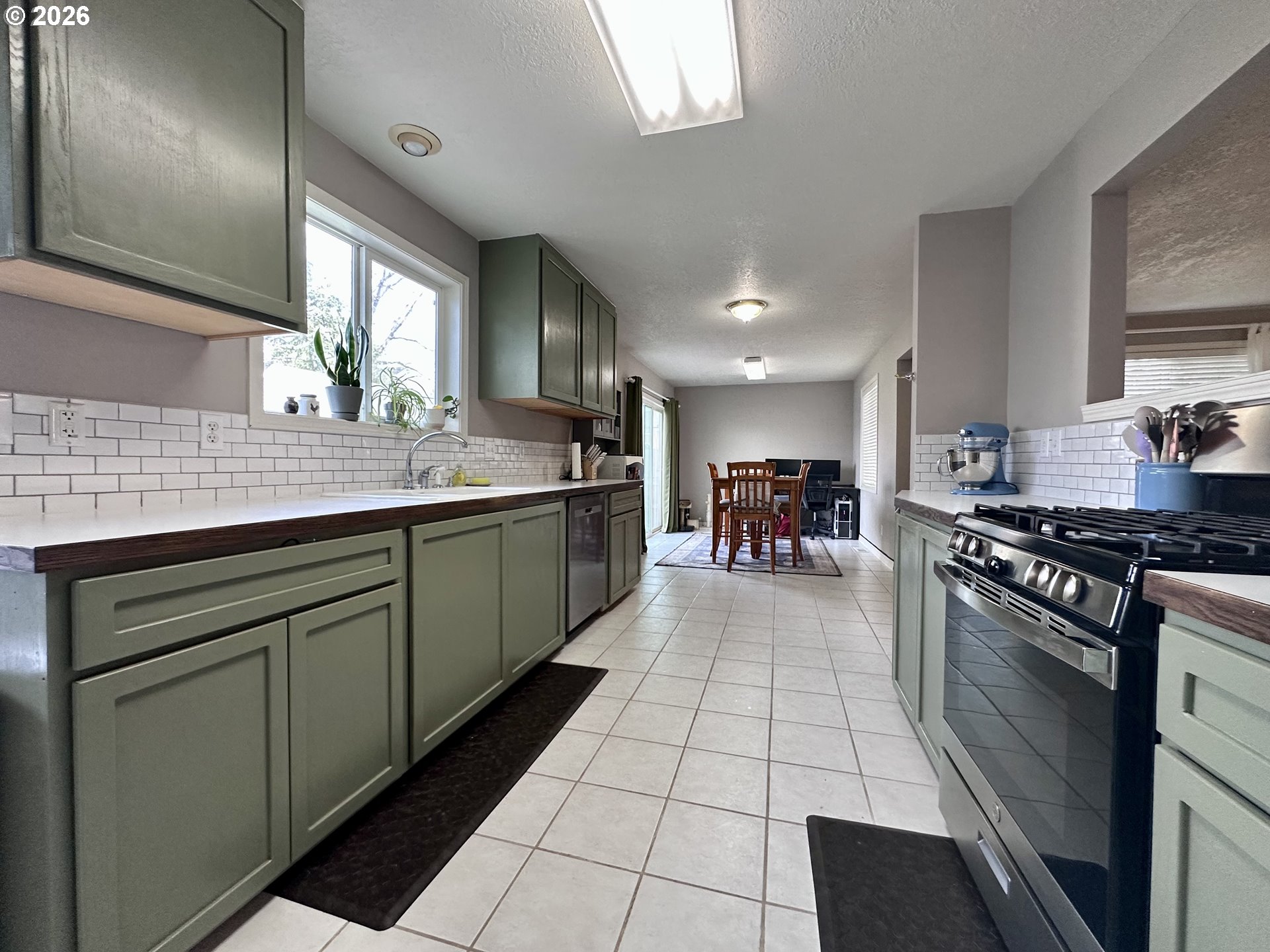 169 West Chestnut Street Union, OR 97883 - Photo 15 of 35 a kitchen with stainless steel appliances granite countertop a sink and cabinets